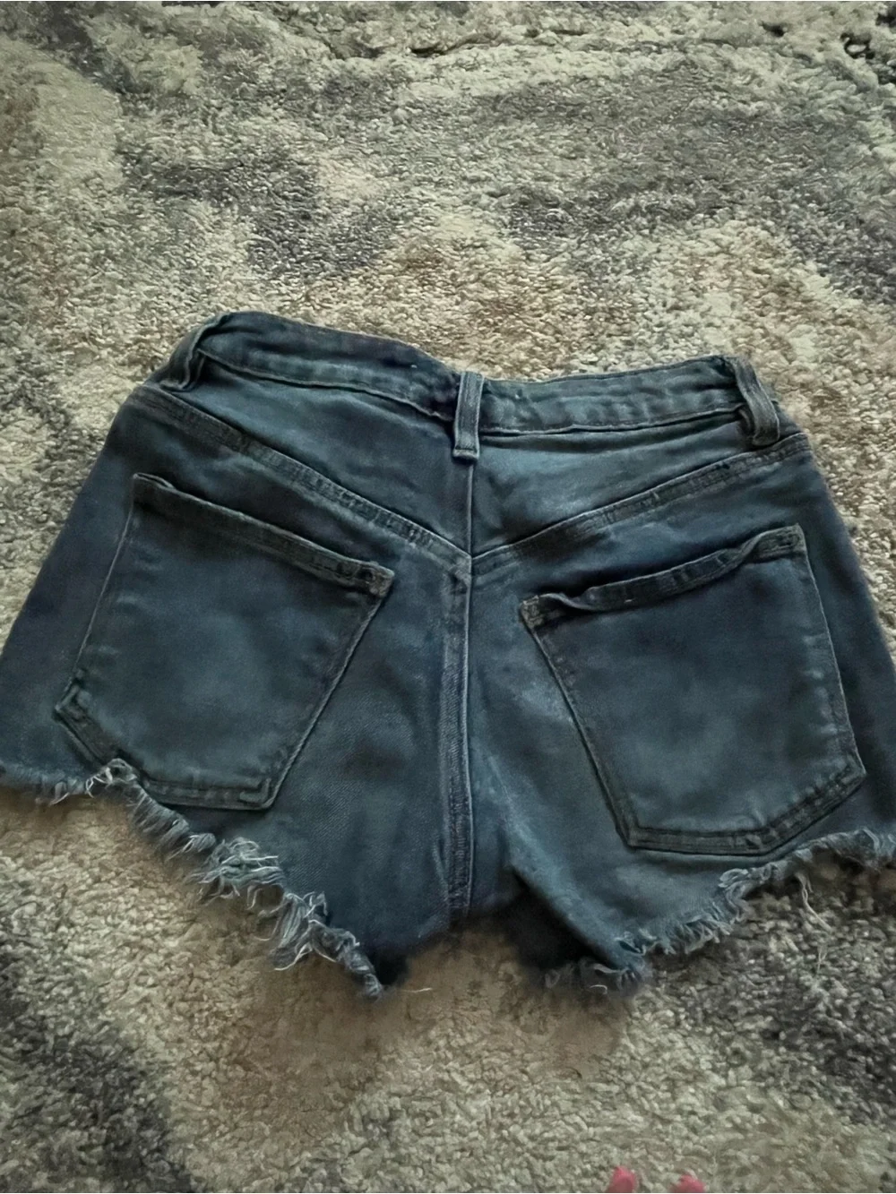 blue denim distressed shorts